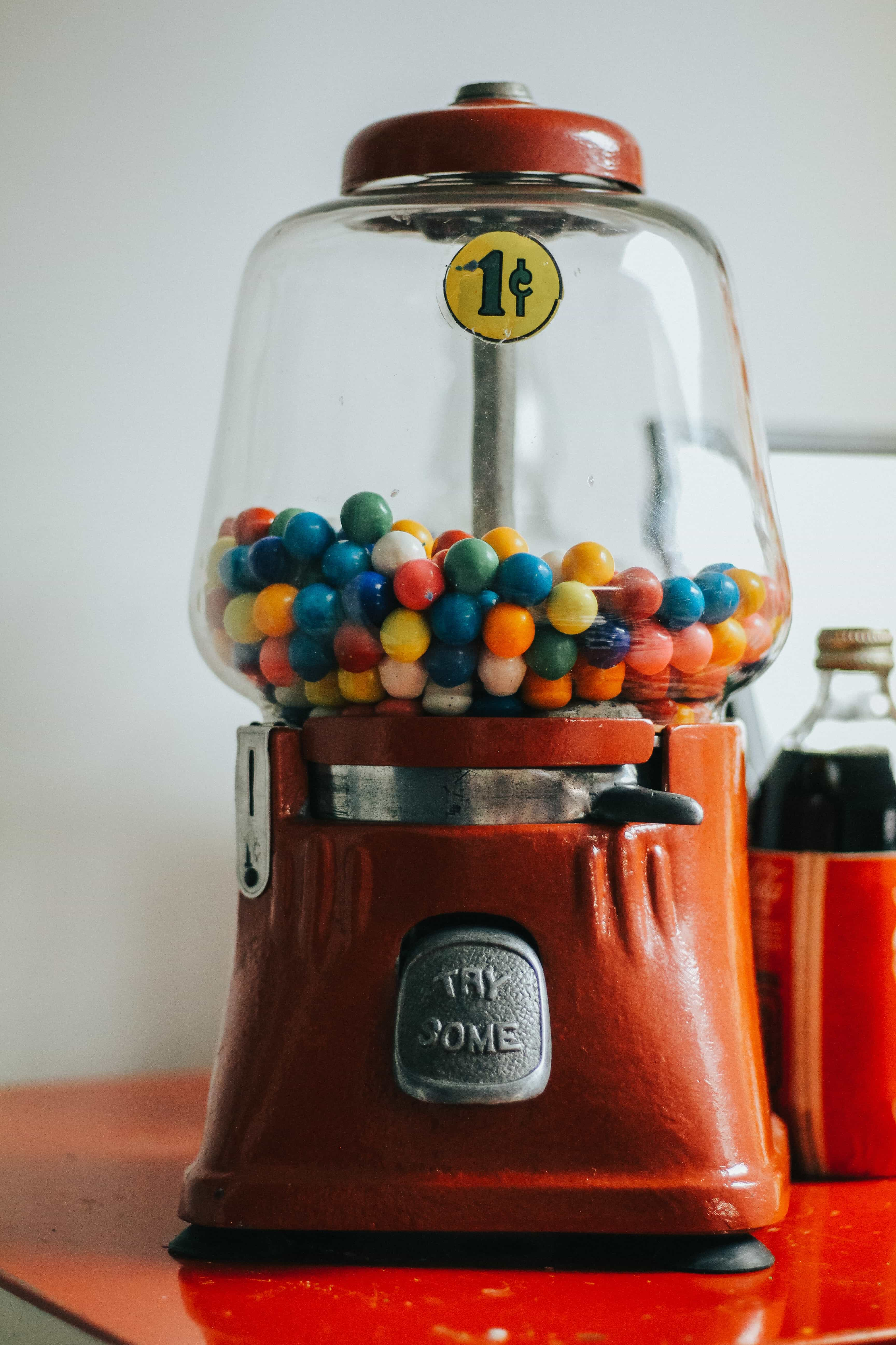 A red gumball machine.